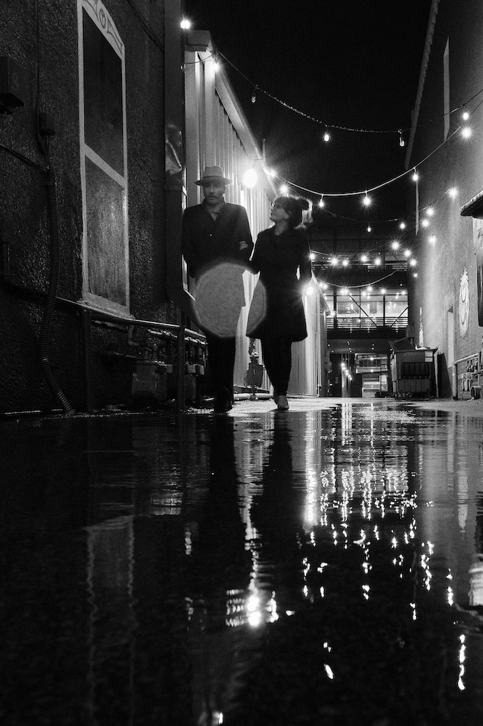 Black and white photo of Asian dub Foundation performing at Rock for Churchill