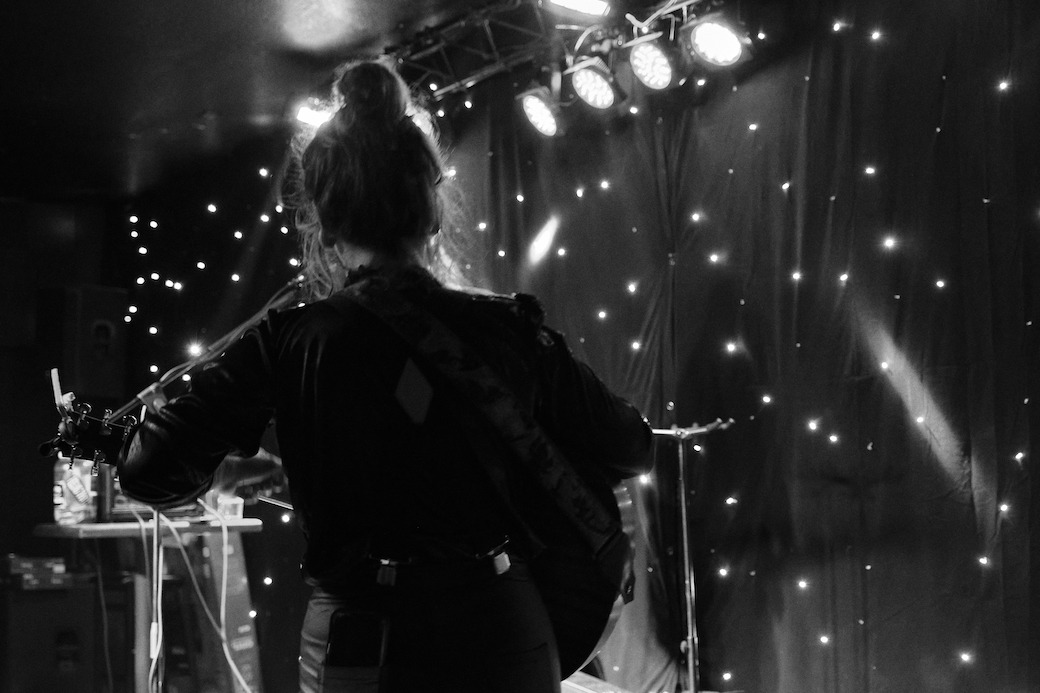 Black and white photo of Samantha Hunt performing in Bentoville Arkansas