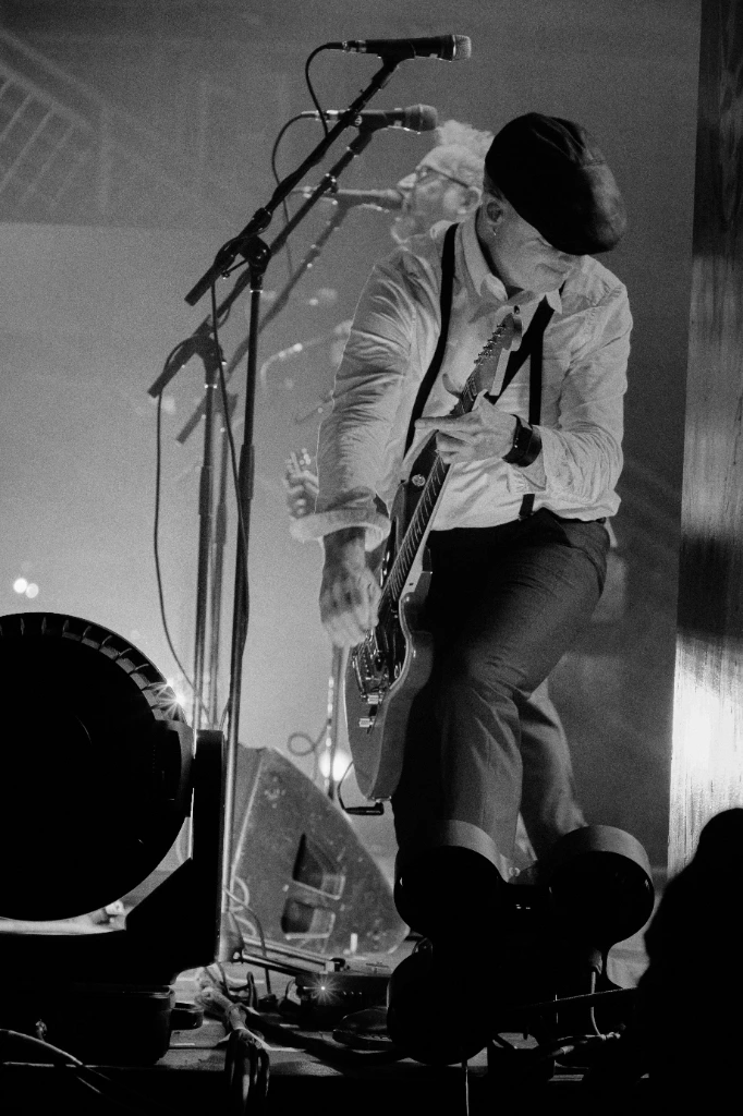 Black and white photo of Asian dub Foundation performing at Rock for Churchill