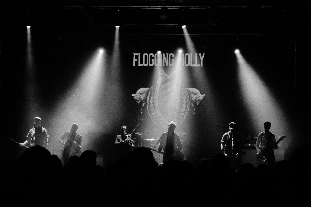 Black and white photo of Asian dub Foundation performing at Rock for Churchill