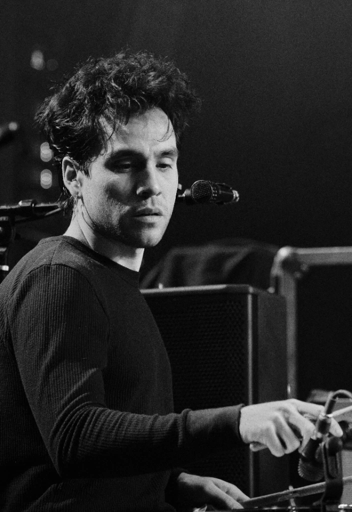 Black and white photo of Asian dub Foundation performing at Rock for Churchill