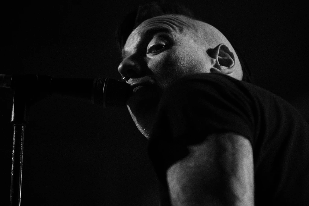 Black and white photo of Asian dub Foundation performing at Rock for Churchill