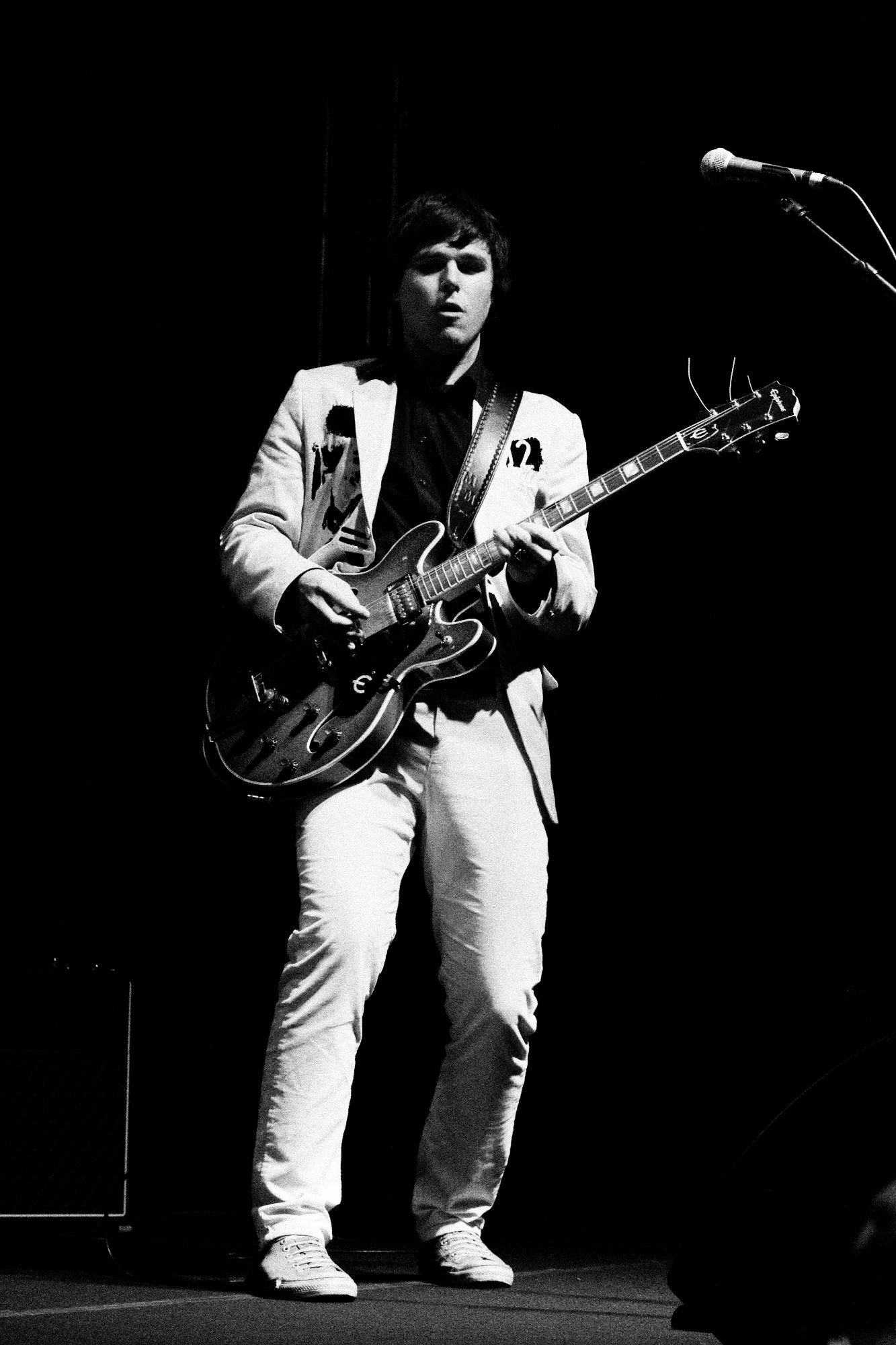 Black and white photo of Status Quo performing live in Olomouc Czech republic