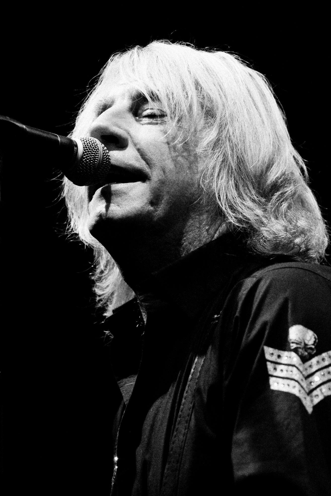 Black and white photo of Status Quo performing live in Olomouc Czech republic