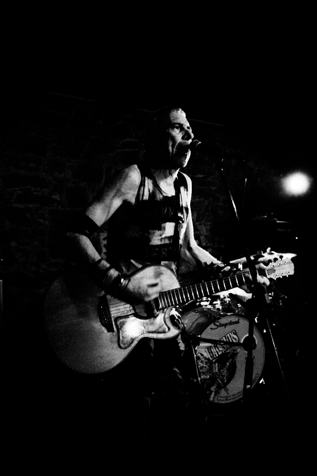 Black and white photo of UK Subs & TV Smith concert in Valasske Mezirici